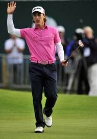 Thorbjorn Olesen of Denmark reacts after making a birdie putt on the 18th green